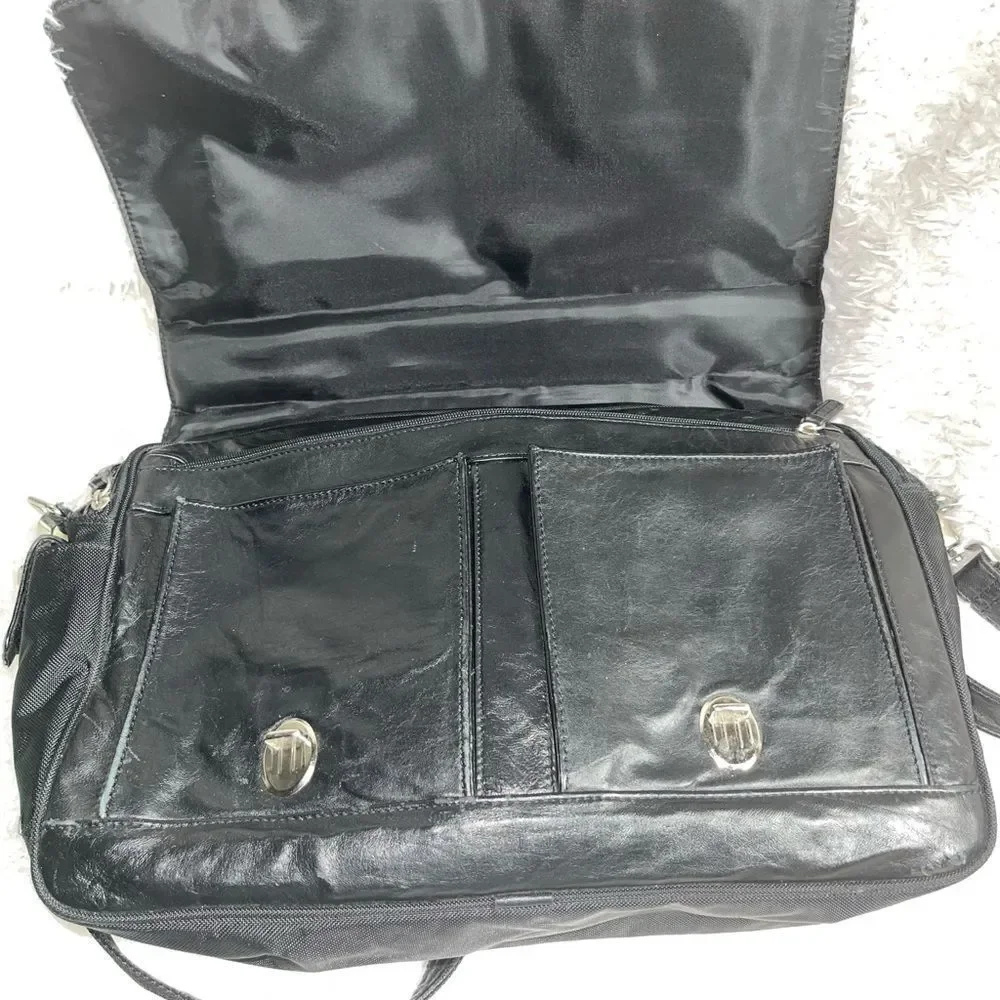 Wilson leather Black Leather Briefcase laptop Nylon side silver tone hardwares.
